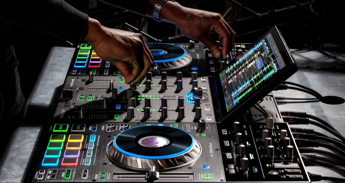 Man DJs on the Denon DJ Prime 4